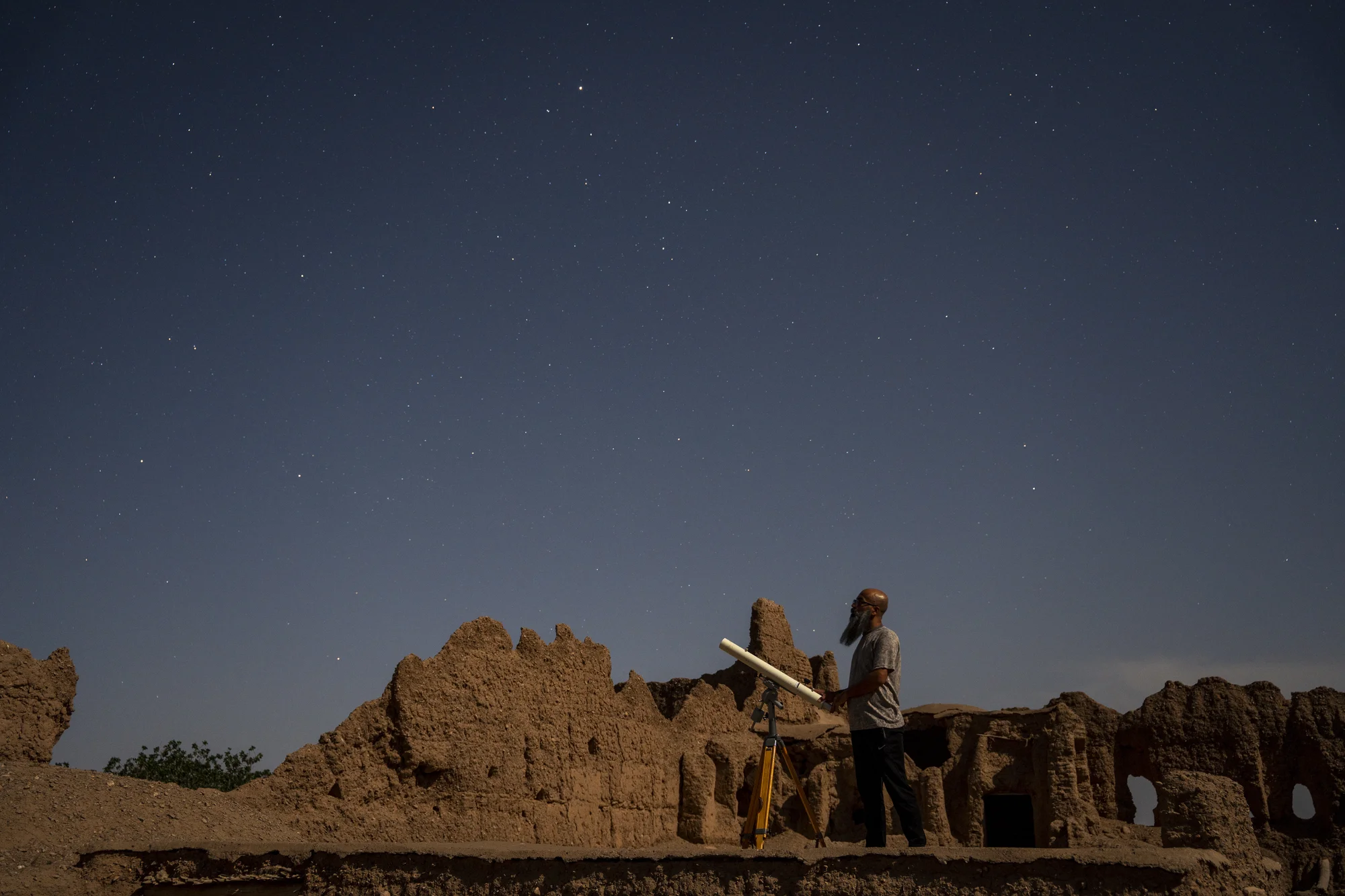 Stargazing with a telescope in the desert near Qaleh Bala