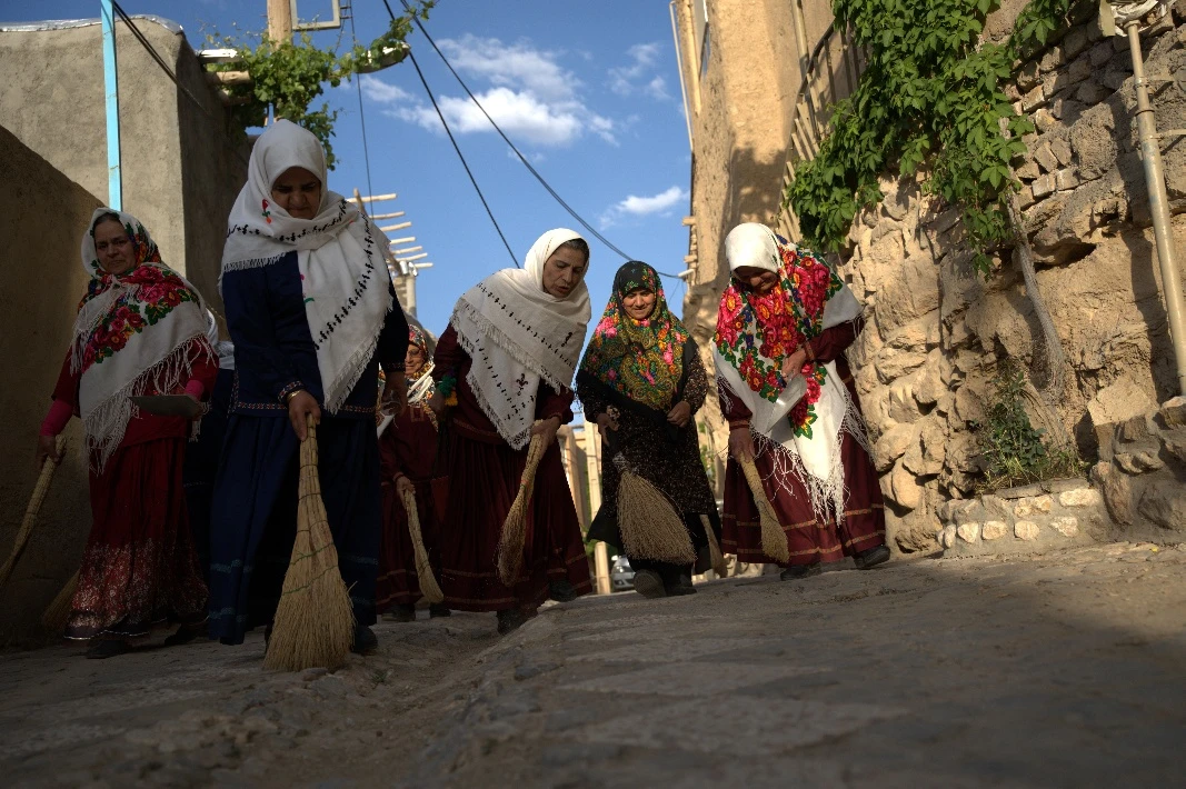 Villagers taking part in the waste-collection drive